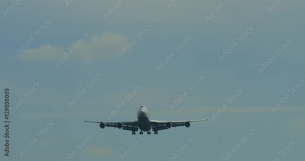 Aircraft from the front landing at an Airport Aircraft from the front landing at an Airport