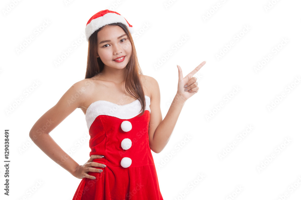 Asian Christmas Santa Claus girl point to blank space. Asian Christmas Santa Claus girl point to blank space.