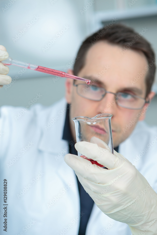 science professional pipetting solution into the glass cuvette science professional pipetting solution into the glass cuvette