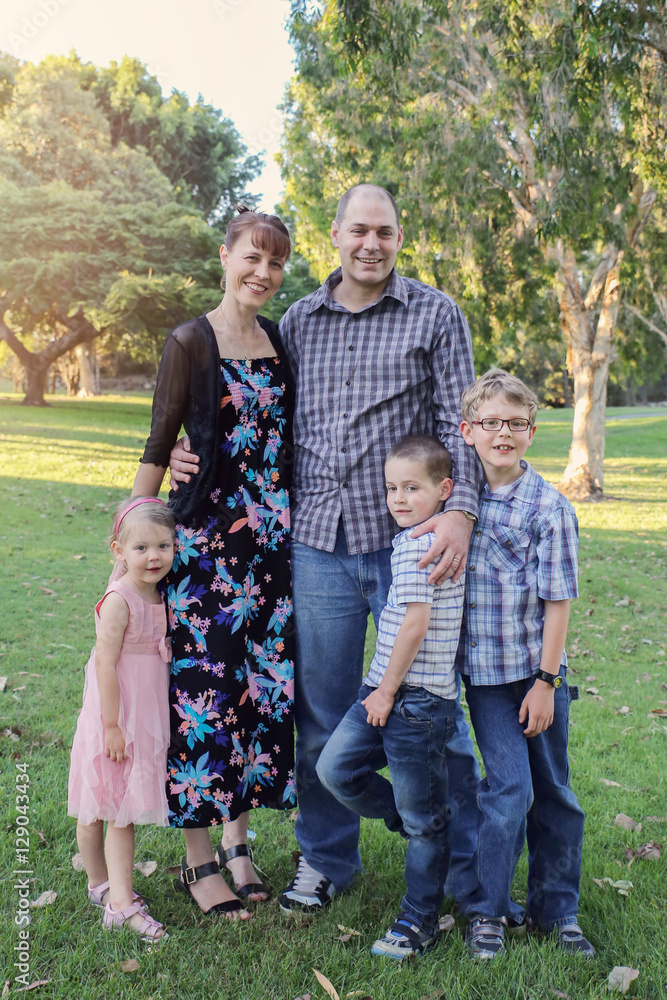 Fototapeta premium Happy family of five in the park
