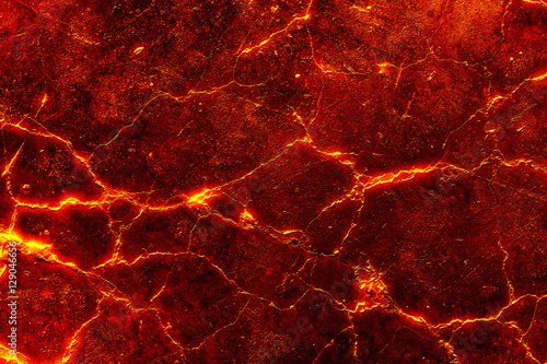 heat red cracked ground texture after eruption volcano photo