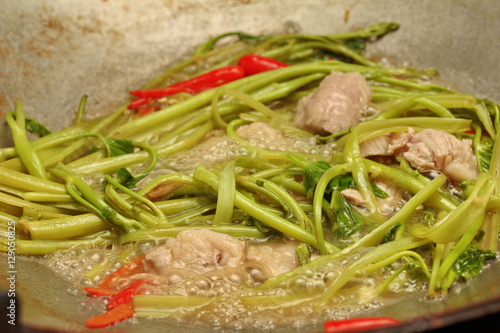 Cooking , Thai spicy fried snow fungus mushroom and morning glor photo