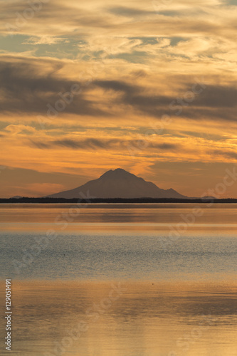 Mt. Redoubt and Skilak Lake at sunset in Alaska.