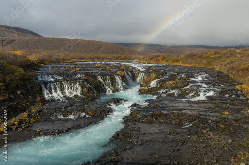 Fototapeta Naklejka Na Ścianę i Meble -  Bruarfoss Waterfall and rainbow in Iceland.