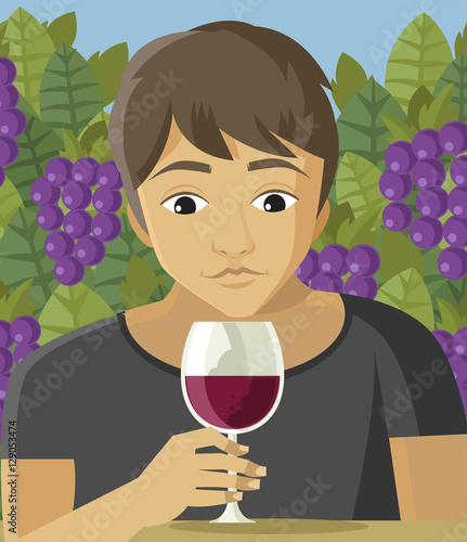 man tasting red wine in the vineyard