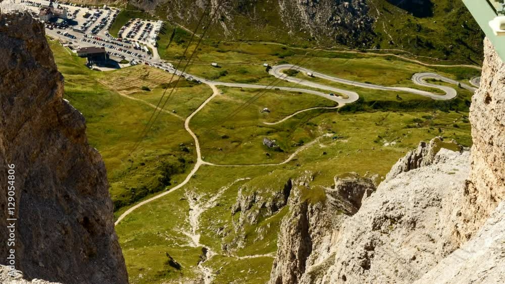 Timelapse of alpine pass from the top of funicular on sunny summer day, Pordoi Pass, Italy Timelapse of alpine pass from the top of funicular on sunny summer day, Pordoi Pass, Italy