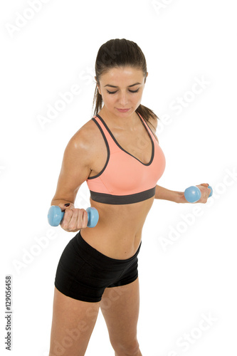 woman in fitness clothes in aerobics training workout posing sexy holding weight