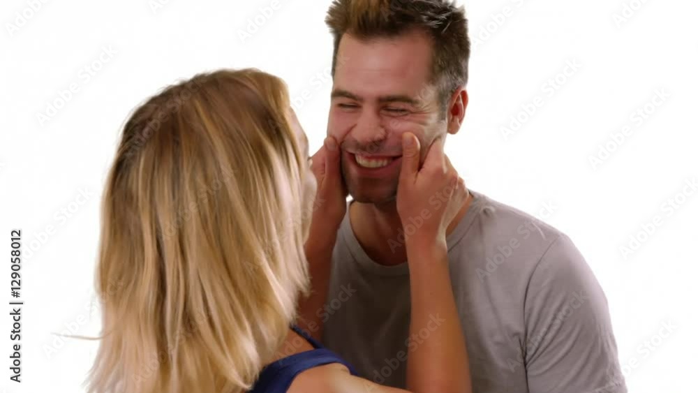 Funny millennial couple being silly and laughing at camera Funny millennial couple being silly and laughing at camera