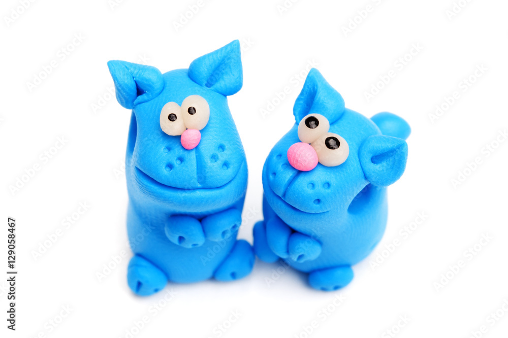 Group of clay toys (cat). Isolated on white background, horizont Group of clay toys (cat). Isolated on white background, horizont