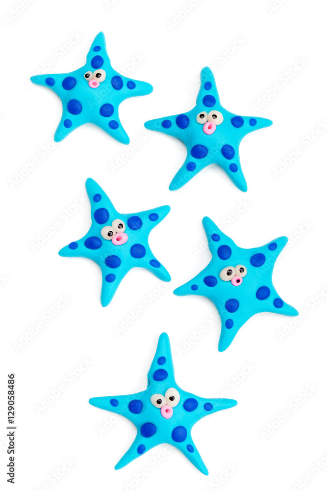 Group of clay toys (starfish). Isolated on white background, hor Group of clay toys (starfish). Isolated on white background, hor