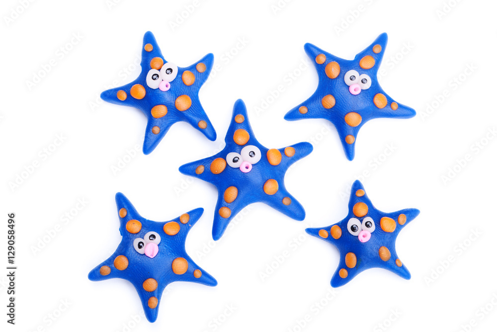 Group of clay toys (starfish). Isolated on white background, hor Group of clay toys (starfish). Isolated on white background, hor