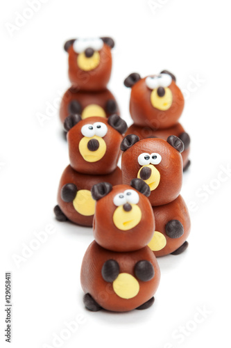 Group of five bear clay toys isolated on white background