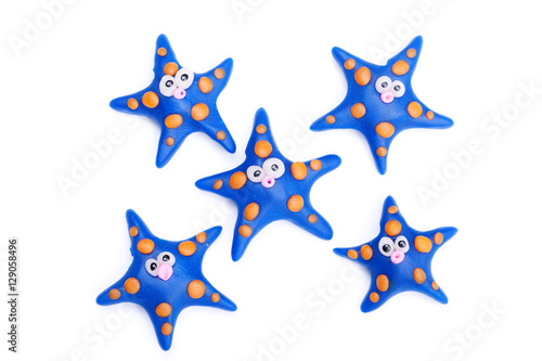 Group of clay toys  starfish . Isolated on white background  hor
