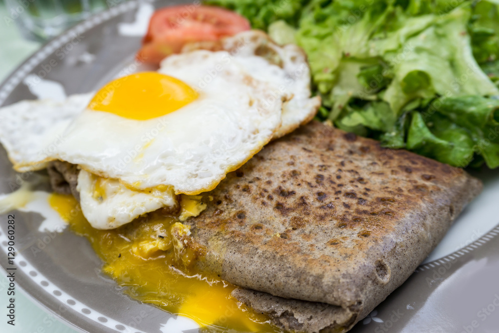 Homemade french buckwheat galette with egg Homemade french buckwheat galette with egg