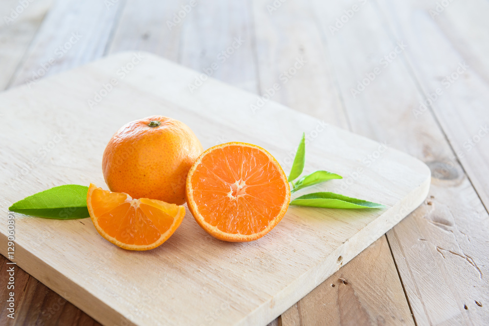 Orange on wooden background Orange on wooden background