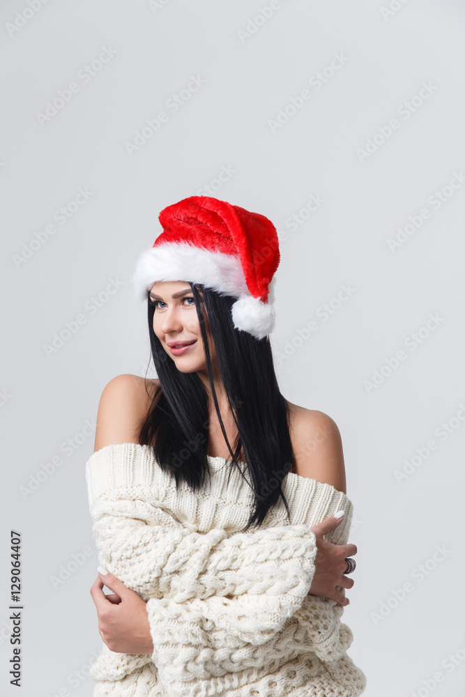 Cheerful brunette in Christmas cap Cheerful brunette in Christmas cap