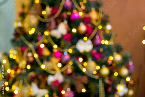 New Year background in purple and gold colors. Bokeh