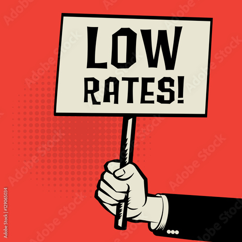 Poster in hand, business concept with text Low Rates