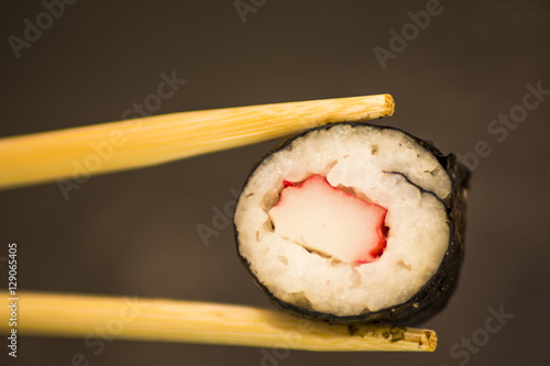 Pieces of sushi on a black stone