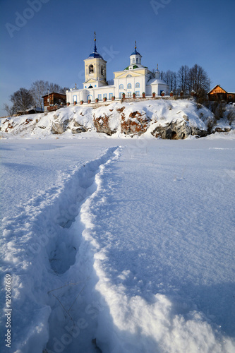 Winter view of the Russian Orthodox Church of St. George in Sloboda village.