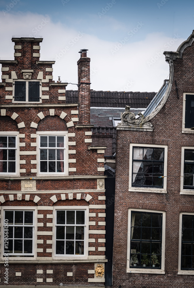 Fototapeta premium Classic crooked house in Amsterdam