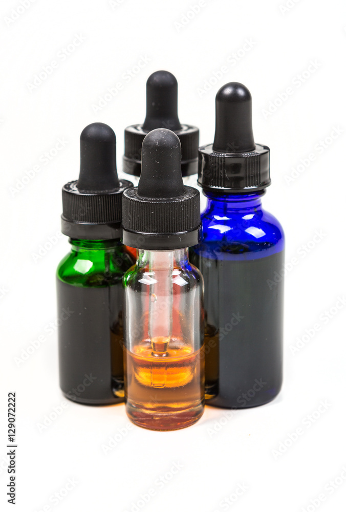 Flavored vape juice isolated on white background Flavored vape juice isolated on white background