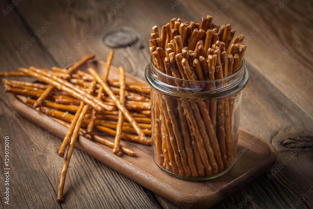 Salty pretzel sticks. Stock Photo Adobe Stock
