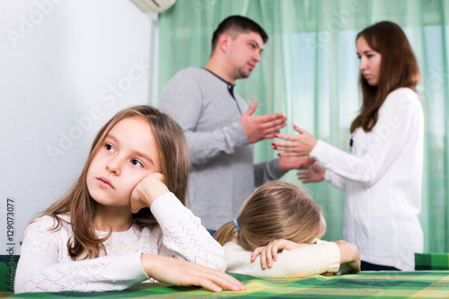 Family of four having quarrel at home © JackF