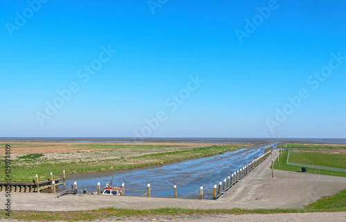 The very small tidal sea harbor of Noordpolderzijl at the Wadden