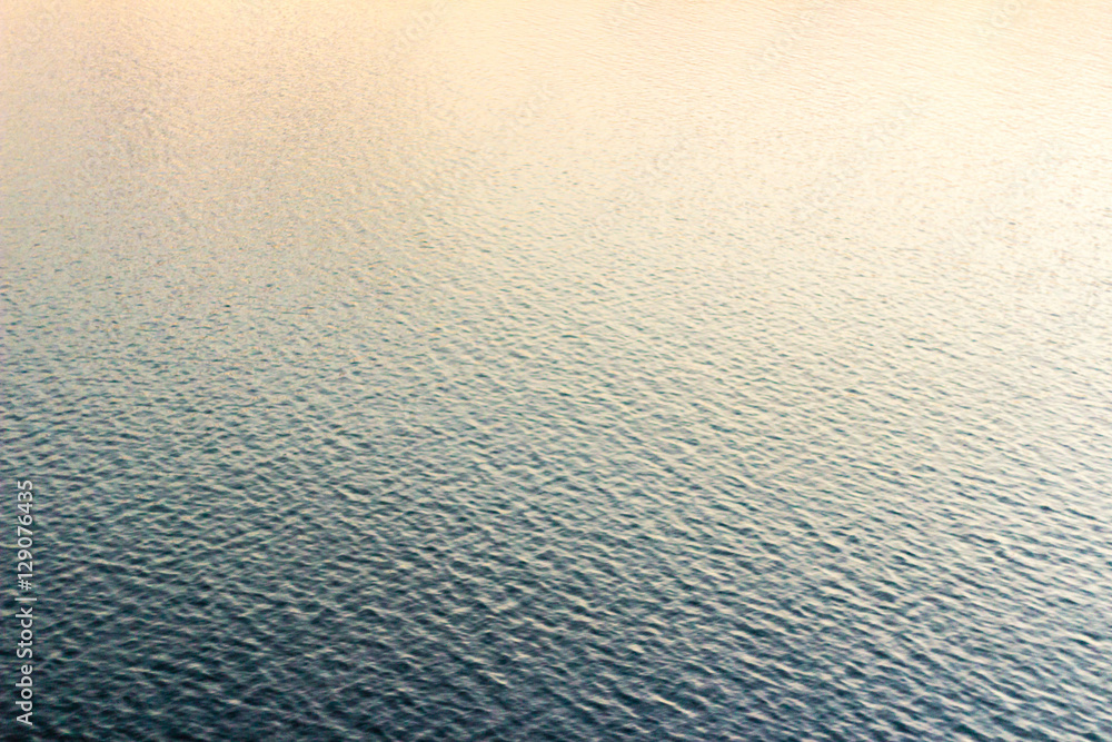 Obraz premium Gradient sea wave pattern at sunset