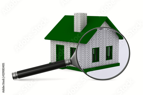 Magnifier and house on whit...