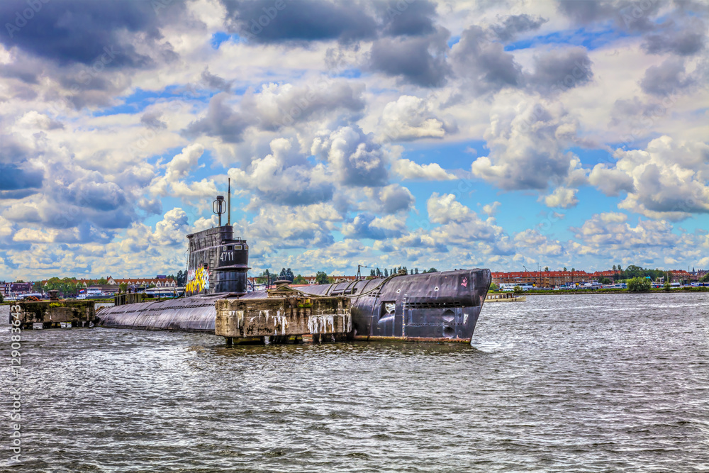 NETHERLANDS, AMSTERDAM - AUGUST 30, 2011: Old submarine on the NDSM-Werf, sponsored by the city, the artistic community called Kinetisch North, a center for underground culture. HDR Image.