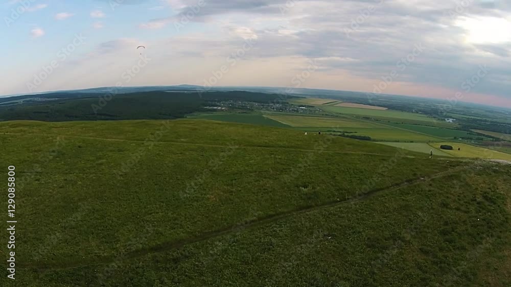 Aerial view of paragliding near the mountain solitary Toratau Aerial view of paragliding near the mountain solitary Toratau