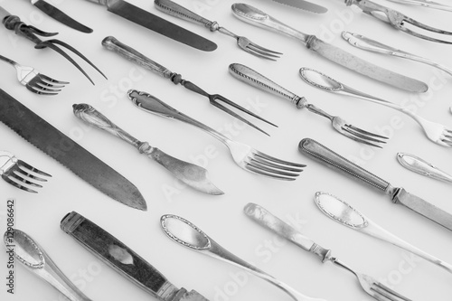 beautiful silver cutlery - vintage flatware isolated on white ba