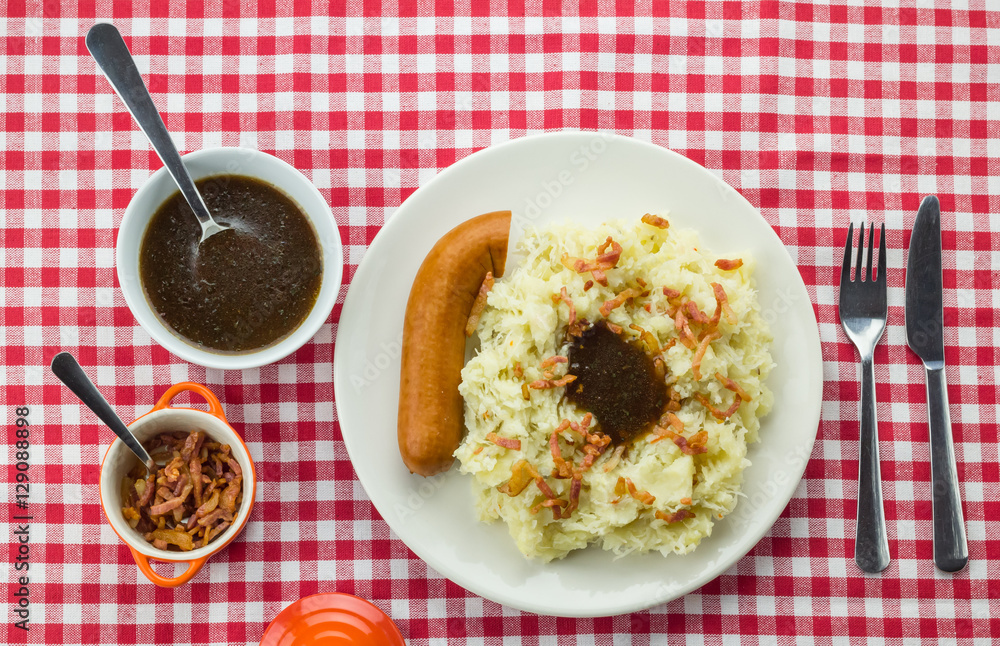 Typical dutch dish zuurkool with sauerkraut, smoked sausage and