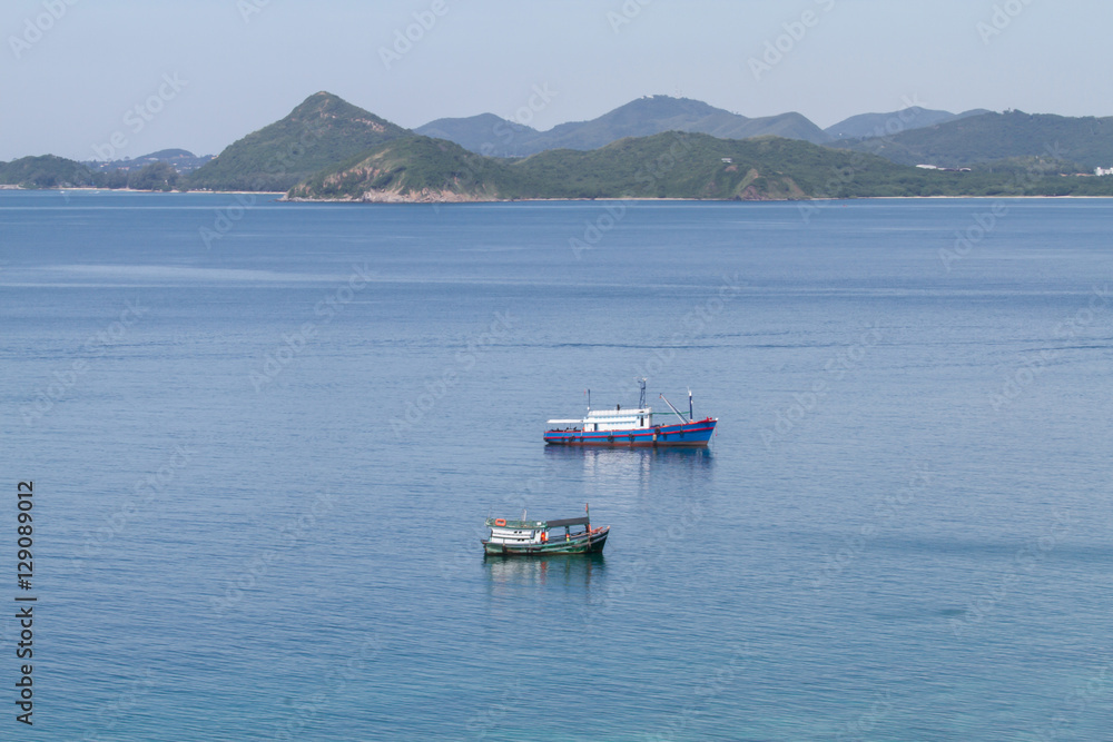 thai fishing boat floating on duty in mid sea