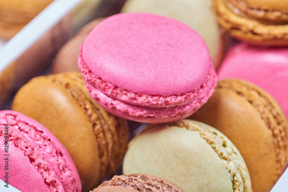 Colorful french macaroons in a box