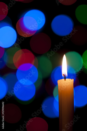 Candle and Christmas background