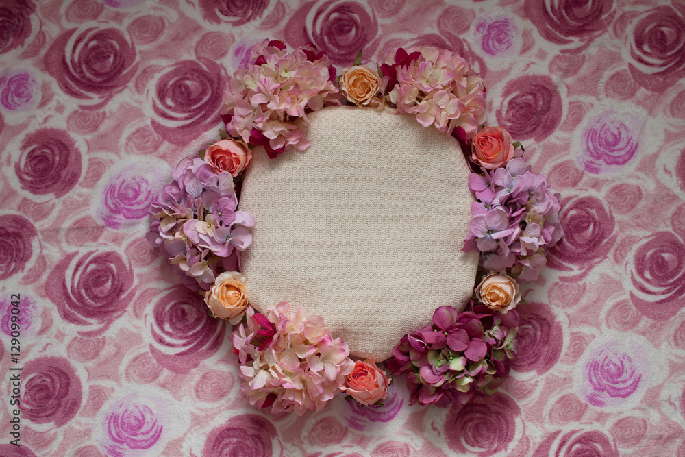 pink flowers and round basket on tender pink background pink flowers and round basket on tender pink background