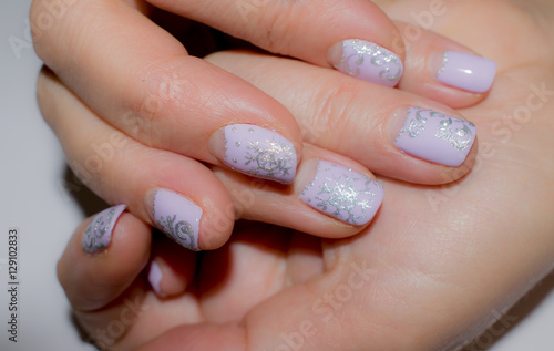 Female fingers with beautiful manicure on nails