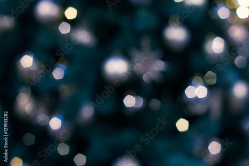 Colorful lights on red background. holiday bokeh. Abstract Christmas
