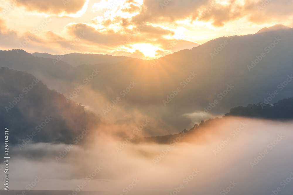 Morning fog and the beautiful sun light in a landscape Morning fog and the beautiful sun light in a landscape