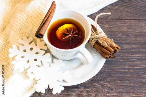 Spiced tea on rustic background photo