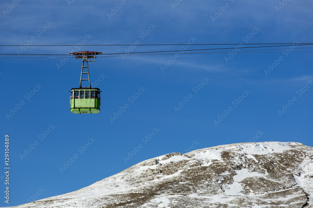 Cable car with blue sky in background