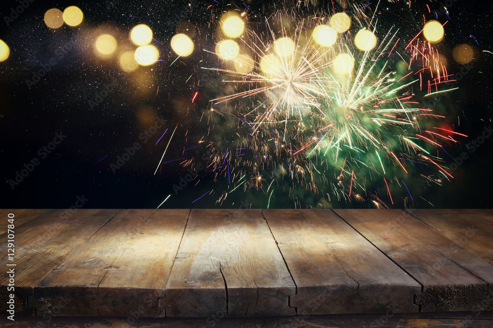 Empty wooden table in front of fireworks background Stock Photo | Adobe ...