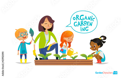 Teacher and kids engaged in gardening in the backyard. Girl watering flowers in the garden. Eco concept. Montessori education concept. Organic gardening.