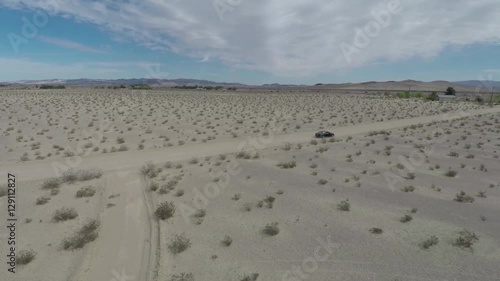 Car Driving Desert Road Black Lexus Aerial 2.mov