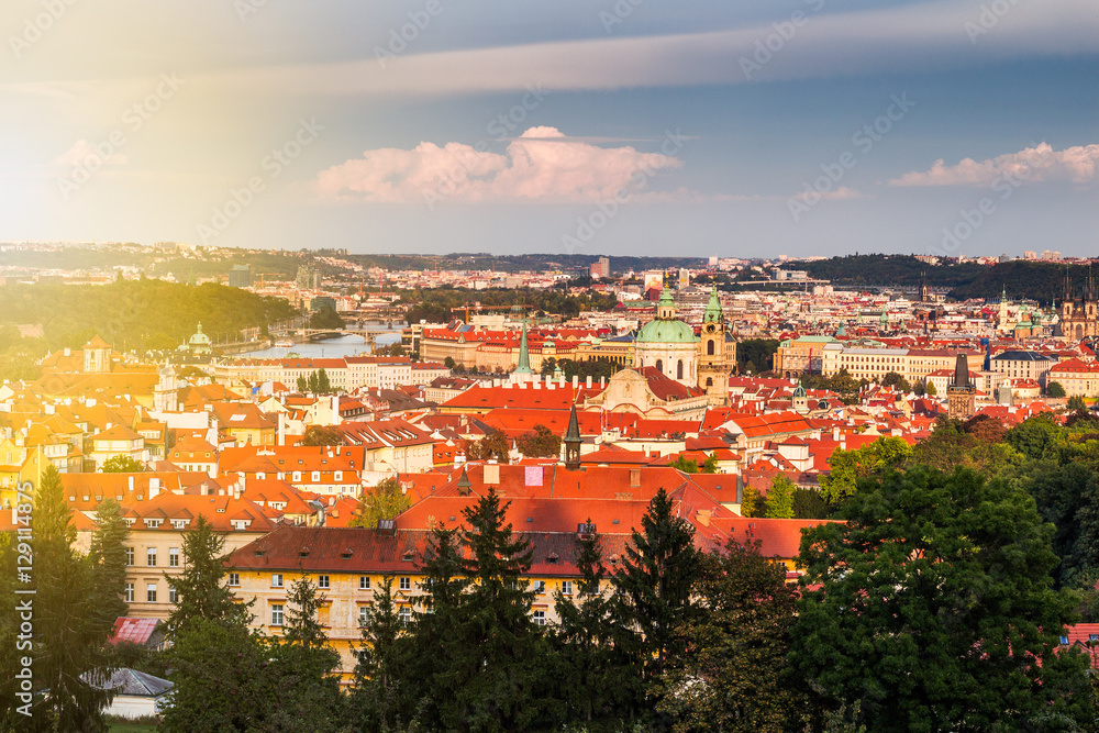 Evening summer Prague panorama from Old Town Bridge Tower with Charles Bridge, Prague Castle, Vltava river and historical architecture. Concept of Europe travel, sightseeing and tourism.