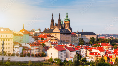 Evening summer Prague panorama from Old Town Bridge Tower with Charles Bridge, Prague Castle, Vltava river and historical architecture. Concept of Europe travel, sightseeing and tourism.