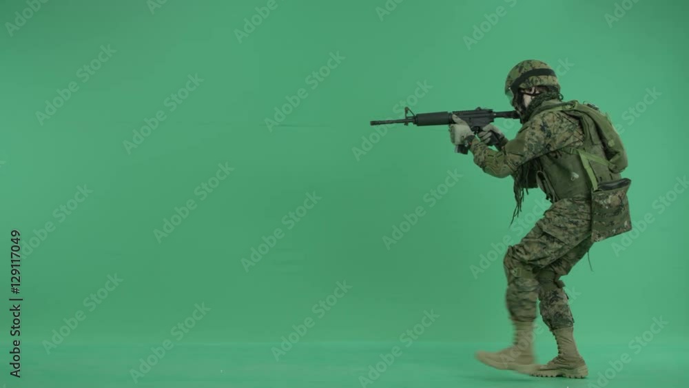soldier targeting at the green screen back ground soldier targeting at the green screen back ground